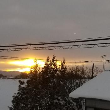 雲間からの朝日